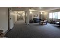 Inviting lobby area with comfortable seating, stylish decor, and well-lit hallway at 14000 N 94Th St # 3147, Scottsdale, AZ 85260