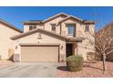 Attractive two-story home with a well-maintained front yard and an attached two-car garage at 45608 W Barbara Ln, Maricopa, AZ 85139