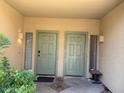 Private entrance with a covered doorway and well-kept landscaping at 15655 N 29Th St, Phoenix, AZ 85032