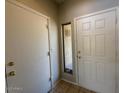 Bright entryway with tile flooring and direct access to the garage at 15655 N 29Th St, Phoenix, AZ 85032