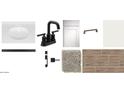 This bathroom design shows a white sink, black faucet, and complimentary hardware and fixtures at 2337 E Homesteader Rd, San Tan Valley, AZ 85140