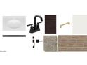 Bathroom materials showcasing a white sink, dark faucet, dark cabinet, and wood-look tile at 2337 E Homesteader Rd, San Tan Valley, AZ 85140