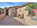 Outdoor patio with brick pavers and seating area, ideal for relaxation and enjoying the outdoor scenery at 2611 E San Simeon Dr, Casa Grande, AZ 85194
