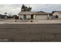 Charming single-story home with a two-car garage and xeriscaped front yard at 5430 N 74Th Ave, Glendale, AZ 85303