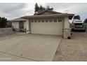 Attached two-car garage in a single-story home at 5430 N 74Th Ave, Glendale, AZ 85303