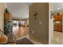 Inviting hallway leading to a spacious living area, highlighting open-concept design and warm natural light at 144 W Bahamas Dr, Casa Grande, AZ 85122