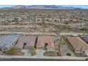 Expansive aerial view of the desert neighborhood and mountain backdrop at 14939 S 185Th Ave, Goodyear, AZ 85338