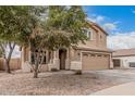 Lovely home boasting mature landscaping, a covered entry, and a convenient two-car garage at 22337 E Via Del Palo --, Queen Creek, AZ 85142