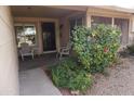 Charming front porch with seating area and lush foliage at 4773 E Hopi St, Phoenix, AZ 85044