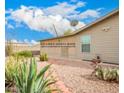 The exterior view shows a beautiful Arizona room addition perfect for relaxing and entertaining at 3301 S Goldfield Rd # 2105, Apache Junction, AZ 85119