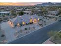 Elegant single-story home featuring a grand entrance, desert landscaping, and a spacious driveway at 9826 N 131St St, Scottsdale, AZ 85259