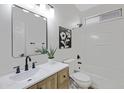 Bathroom with modern vanity, and shower-tub combination at 19862 E Carriage Way, Queen Creek, AZ 85142