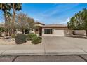 Well-maintained home with a two-car garage and neatly landscaped front yard at 4518 E Aspen Way, Gilbert, AZ 85234