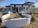 Exterior view of lovely home with fountain and desert landscaping at 7636 E Coronado Rd, Mesa, AZ 85207