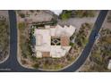 Stunning aerial view of estate with private pool, courtyard and desert landscaping at 10040 E Happy Valley Rd # 269, Scottsdale, AZ 85255