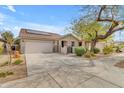 Inviting single-Gathering home featuring a well-maintained yard and wide driveway at 21816 E Puesta Del Sol --, Queen Creek, AZ 85142