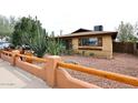 Charming brick home with beautiful desert landscaping at 2619 W Lamar Rd, Phoenix, AZ 85017