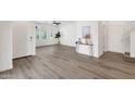 Spacious living room showcasing hardwood floors, natural light, and neutral paint colors at 2765 S Cavalier Dr # 102, Gilbert, AZ 85295