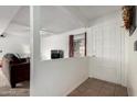 Entryway with tile floor and front door, giving way to a living room at 3037 W Libby St, Phoenix, AZ 85053