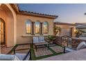 Cozy outdoor patio with comfortable seating, perfect for relaxing and enjoying the serene surroundings of the home at 7589 W Firebird Dr, Glendale, AZ 85308