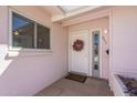 Inviting front entrance with a classic white door, decorative wreath and stylish address numbers at 8613 E Citrus Way, Scottsdale, AZ 85250