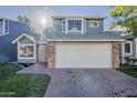 Charming two-story home with a two car garage and manicured front lawn at 18624 N 4Th Ave, Phoenix, AZ 85027