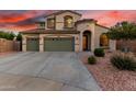 Charming two-story home featuring a 3-car garage and a beautiful landscaped front yard at 19137 W Pasadena Ave, Litchfield Park, AZ 85340