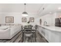 Open dining area with modern decor connecting living room and kitchen at 19777 N 76Th St # 1219, Scottsdale, AZ 85255