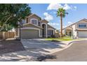 This home features a well-kept lawn, a basketball hoop and a beautiful palm tree at 2640 S Terripin Cir, Mesa, AZ 85209