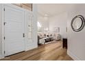 Bright, airy foyer featuring high ceilings, a double door entry and seamlessly flowing into the living area at 9393 E Hunter Ct, Scottsdale, AZ 85262