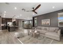 Open-concept living room showcasing modern furnishings and neutral color palette at 9932 E Tumbleweed Ave, Mesa, AZ 85212