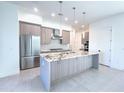Bright and modern kitchen with stainless steel appliances, granite countertops, and ample cabinet space at 1 Easy St # 7, Carefree, AZ 85377