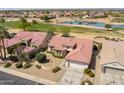 Charming single-Gathering home showcasing a well-manicured front yard and a two-car garage at 16100 W Galleria Ln, Surprise, AZ 85374