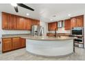 Spacious kitchen with custom wood cabinets, granite countertops, and stainless steel appliances at 3224 E Sweetwater Ave, Phoenix, AZ 85032