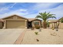 Charming single-story home with desert landscaping, two-car garage, and inviting curb appeal at 6390 S Granite Dr, Chandler, AZ 85249