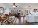 Cozy living room with hardwood floors, comfortable seating, and ample natural light at 6390 S Granite Dr, Chandler, AZ 85249