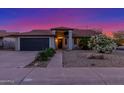 Charming single-story home with desert landscaping, inviting entryway, and attached garage, showcasing curb appeal at 756 E Appaloosa Rd, Gilbert, AZ 85296
