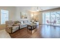 Living room features hardwood floors, comfortable seating and bright, natural light at 9750 N Monterey Dr # 50, Fountain Hills, AZ 85268