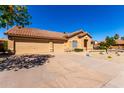 Charming single-Gathering home with three-car garage, desert landscaping, and inviting curb appeal at 1182 E Harrison St, Gilbert, AZ 85295