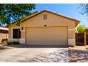 Charming single-Gathering home with a two-car garage and low-maintenance landscaping at 3899 S Chaparral Rd, Apache Junction, AZ 85119