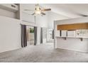 Bright and open living area with high ceilings and large sliding doors at 3948 W Butler St, Chandler, AZ 85226