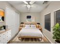 Inviting bedroom featuring soft, white linens and a calming, neutral color palette at 5133 S Brice --, Mesa, AZ 85212