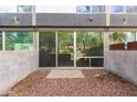 Neutral patio with a modern design and large sliding glass doors at 525 E Willetta St # 2, Phoenix, AZ 85004