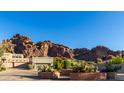 Desert property overlooks mountain views and has a desert landscape with cacti and succulents at 5970 N Echo Canyon Dr, Phoenix, AZ 85018