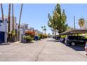 Street view of condominiums, parking, and desert landscaping at 902 W Glendale Ave # 115, Phoenix, AZ 85021