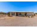 Charming home with a covered entrance and desert landscaping, offering curb appeal and a welcoming exterior at 13802 N 186Th Ave, Surprise, AZ 85388