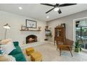 Inviting living room features a charming fireplace, plush seating, and stylish decor accents at 2405 E Balboa Dr, Tempe, AZ 85282