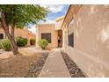 Inviting single story home featuring neutral stucco and desert landscaping at 12244 N Tower Dr, Fountain Hills, AZ 85268