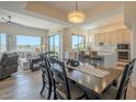 Open-concept living space featuring a dining area, living room and a kitchen with island, perfect for modern living at 16248 E Ridgeline Dr, Fountain Hills, AZ 85268