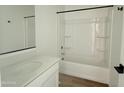 A bright bathroom featuring a tub and shower combination, a vanity, and modern fixtures at 2416 E Spur Dr, San Tan Valley, AZ 85140